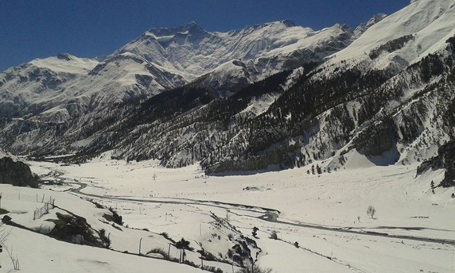 Annapurna Himal and Manang village on ascent to Tharong La