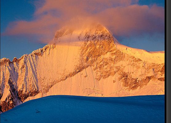 The Seven Thousanders - Sunset on Spantik / Golden Peak ( 7027m ) in the Karakorum Mountains of Pakistan