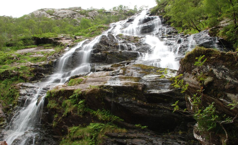 Steall waterfall in Glen Nevis beneath An Gearanach in the Mamores above Glen Nevis