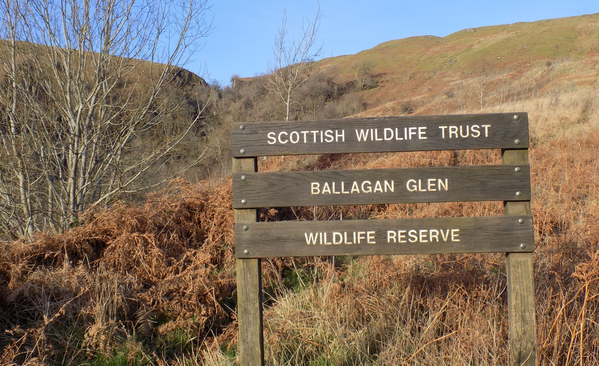 Signpost at Ballagan Glen on the Campsie Fells above Strathblane