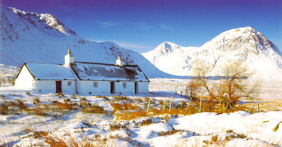 Black Rock Cottage and Buachaille Etive Mor in Glencoe snow covered in winter