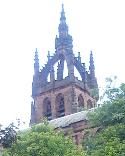 Spire of Kelvin Stevenson Memorial Church above River Kelvin