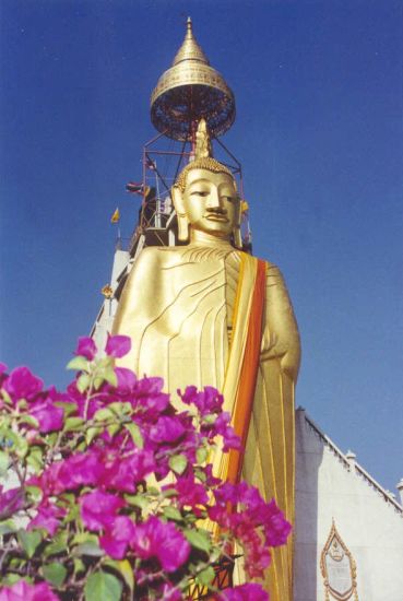 Standing Buddha at Wat Intharawihan in Bangkok